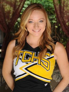 Strawberry blonde cheerleader Indiana Jane strips naked. — photo 2 of 15