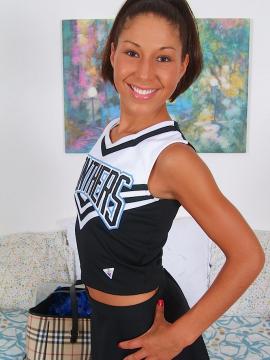 Perky cheerleader Isabella strips down to her white socks. — photo 2 of 15