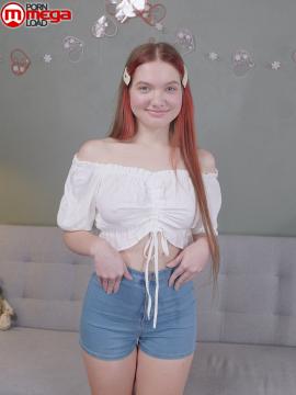 Vivi is a sexy teen with great tits, long legs and an incredibly tight pussy that she fingers upside down on a couch. — photo 2 of 16