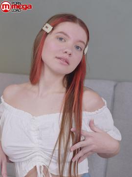 Vivi is a sexy teen with great tits, long legs and an incredibly tight pussy that she fingers upside down on a couch. — photo 4 of 16