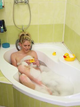 Wet teen plays with her dildo in bath — photo 1 of 24