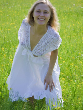 Teen masturbating on the grass — photo 2 of 15