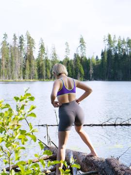 Outdoorsy blonde with cute, perky tits drops her yoga pants and spreads her pussy next to a lake. — photo 1 of 16