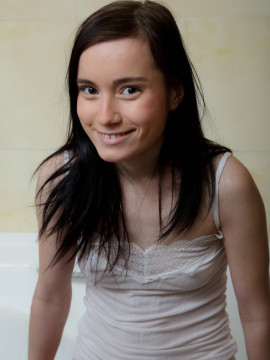 Attractive brunette teen taking a bath — photo 1 of 15